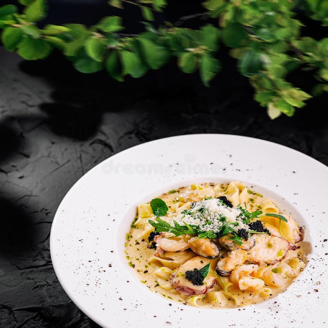 Spigola al Sale — whole sea bass baked in salt crust