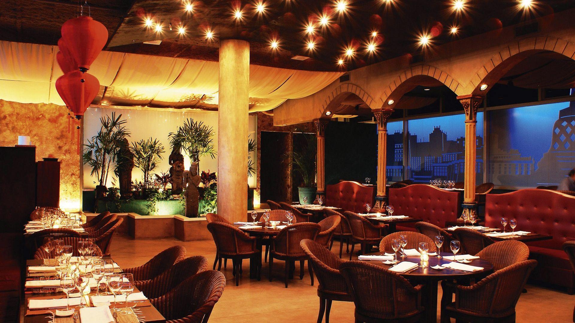 Sun-drenched Mediterranean coastal restaurant terrace